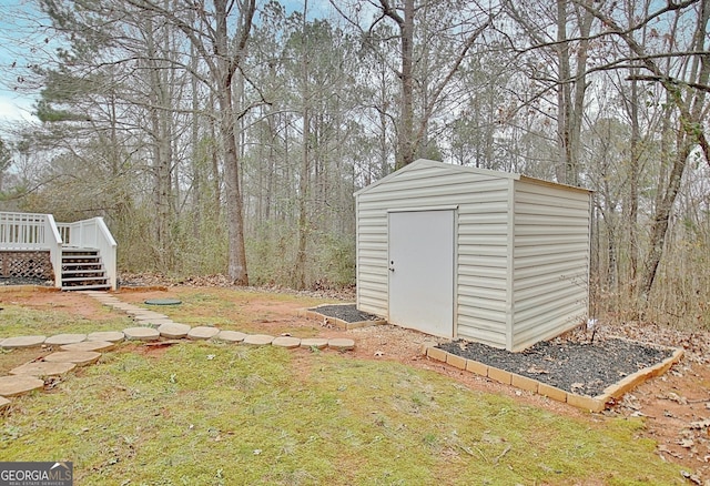 view of outdoor structure with a lawn