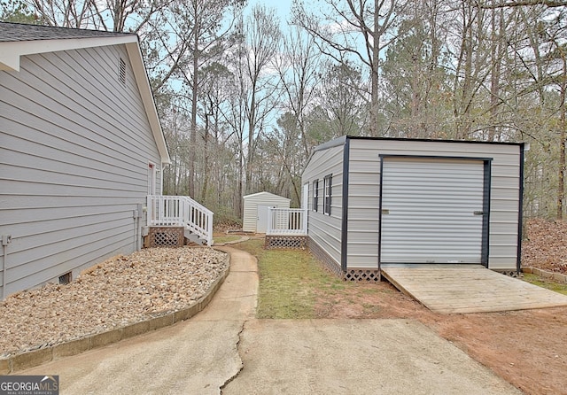 view of outbuilding with a garage