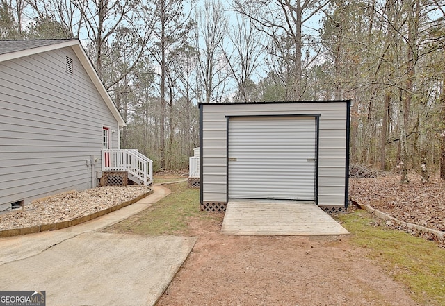 view of outbuilding with a garage