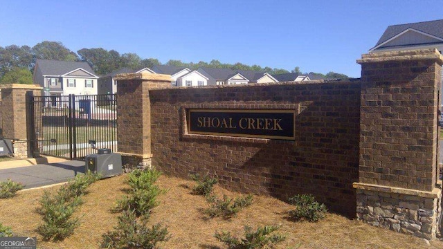 view of community sign