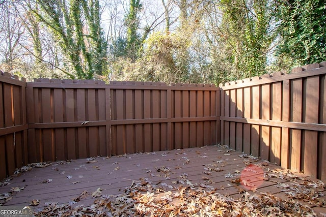 exterior space featuring a wooden deck