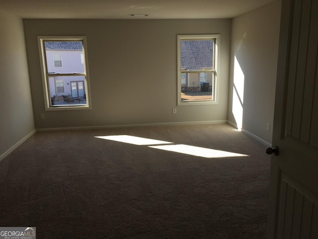 empty room with carpet floors