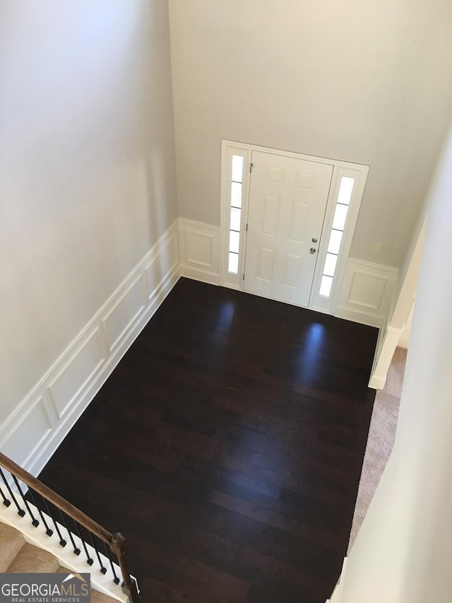 foyer entrance with wood-type flooring