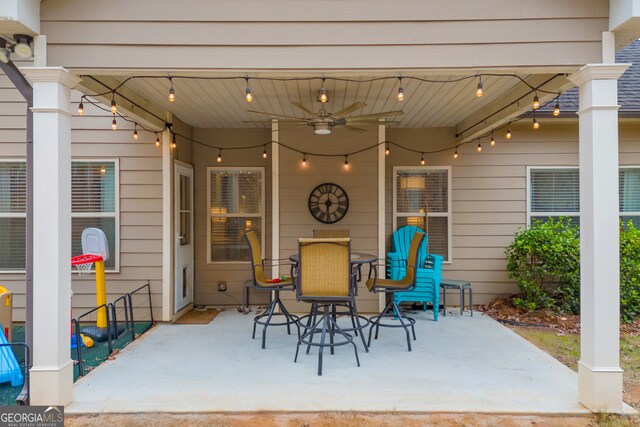 view of patio / terrace with outdoor dining space and ceiling fan