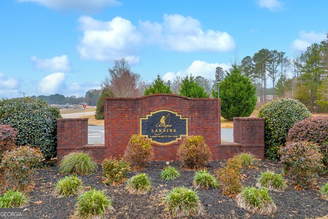 view of community sign