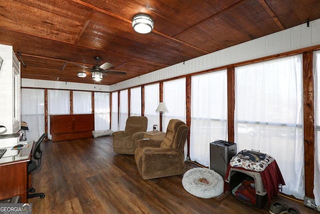 sunroom with ceiling fan and wooden ceiling