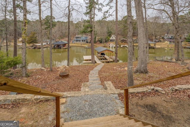 view of dock with a water view