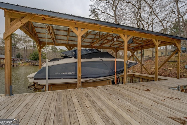 dock area featuring a water view