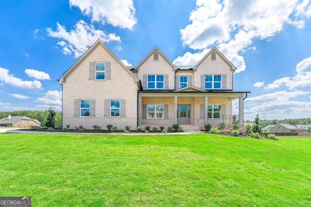 craftsman-style home with a porch and a front yard