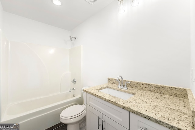 full bathroom featuring shower / tub combination, vanity, and toilet