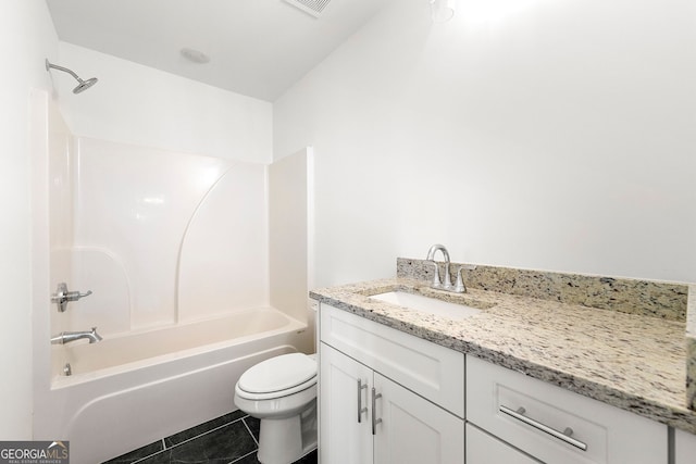 full bathroom featuring toilet, vanity, shower / bath combination, and tile patterned floors