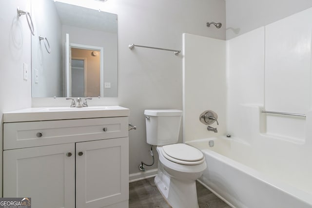 2098 Mallard Crst, Lithonia, GA 30058 - full bathroom with toilet, hardwood / wood-style floors, shower / bathtub combination, and vanity