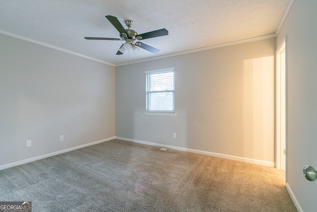 2098 Mallard Crst, Lithonia, GA 30058 - spare room featuring a textured ceiling, ceiling fan, ornamental molding, and carpet flooring