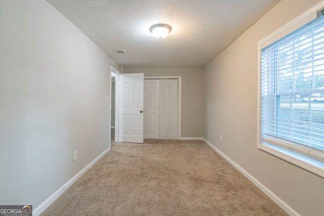 2098 Mallard Crst, Lithonia, GA 30058 - interior space featuring light colored carpet and a closet