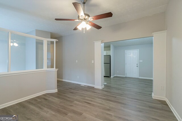 2098 Mallard Crst, Lithonia, GA 30058 - spare room with ceiling fan and hardwood / wood-style flooring