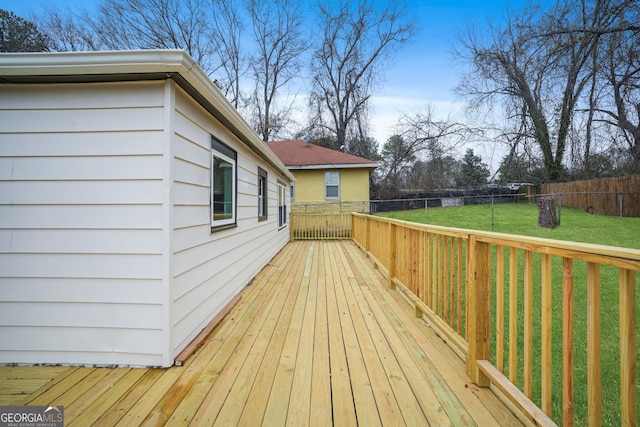 deck featuring a yard