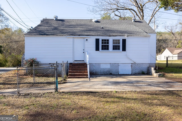 view of front of property with entry steps, a shingled roof, fence, crawl space, and a patio area