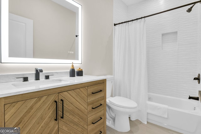 full bathroom with vanity, toilet, and shower / tub combo