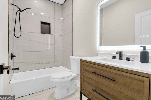 full bathroom featuring tile patterned floors, vanity, tiled shower / bath combo, and toilet