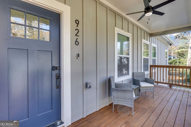 doorway to property with ceiling fan