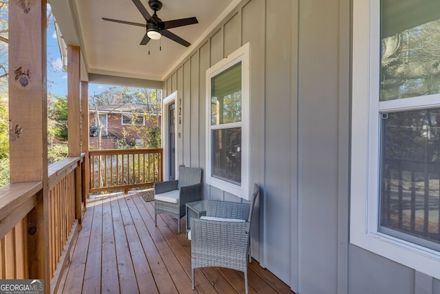 wooden terrace with ceiling fan