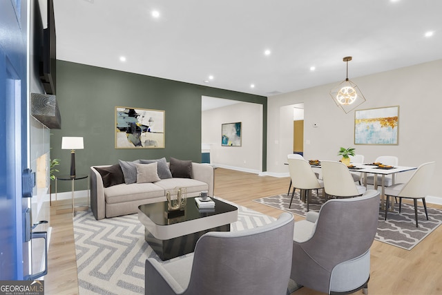 living room with light hardwood / wood-style floors