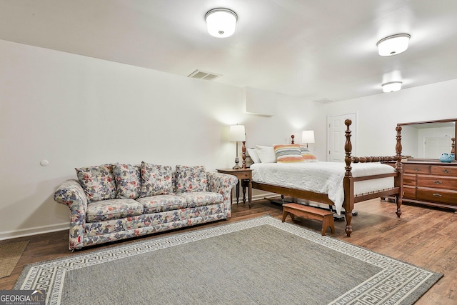 bedroom featuring hardwood / wood-style floors