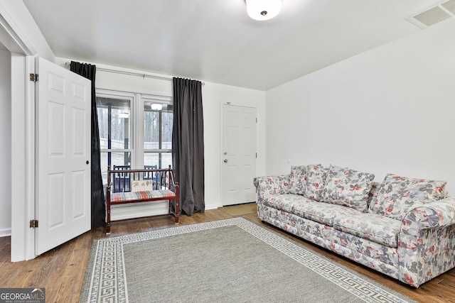 living room with hardwood / wood-style flooring