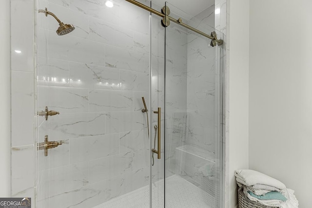 bathroom with an enclosed shower