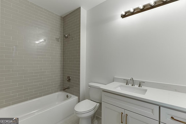 full bathroom featuring tiled shower / bath combo, vanity, and toilet