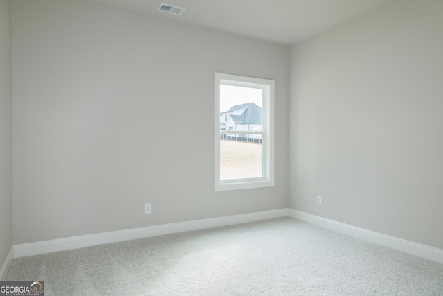 view of carpeted spare room