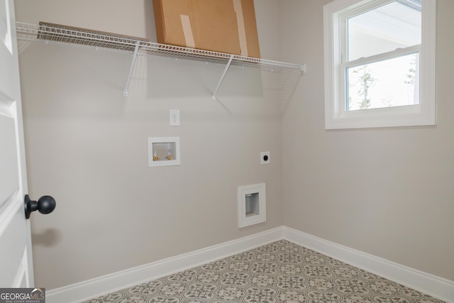 washroom featuring hookup for a washing machine, tile patterned flooring, and hookup for an electric dryer