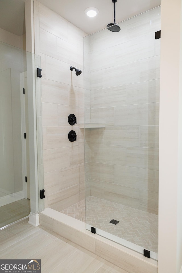 bathroom featuring walk in shower