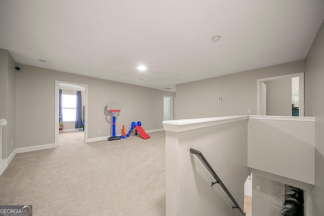 recreation room featuring carpet