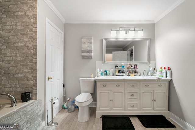 bathroom featuring hardwood / wood-style floors, vanity, tasteful backsplash, and ornamental molding