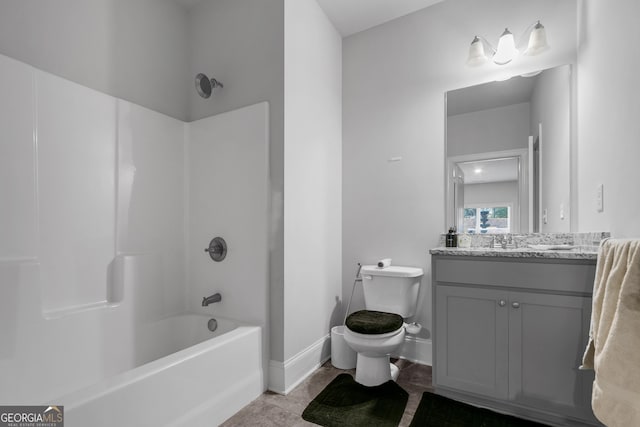 full bathroom featuring tile patterned flooring, shower / washtub combination, vanity, and toilet