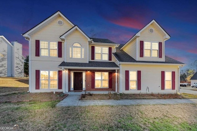 view of front of house featuring a yard