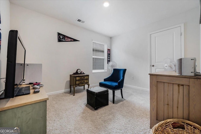 living area with carpet floors