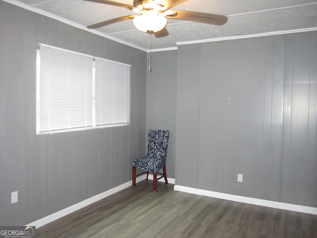 unfurnished room with crown molding, ceiling fan, and dark wood-type flooring