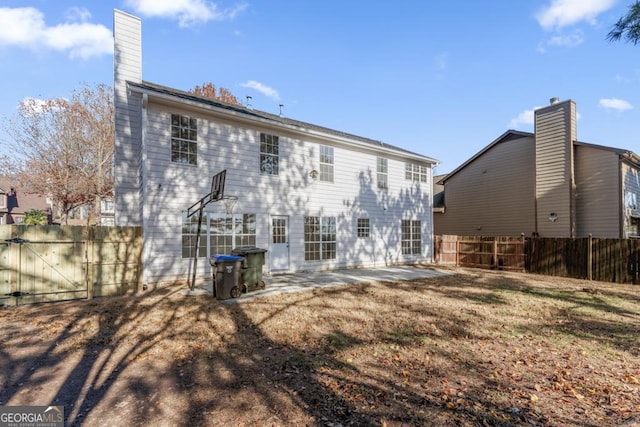 back of house featuring a patio