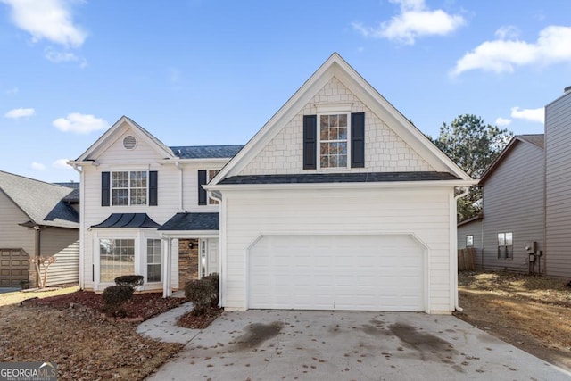 view of front of home with a garage