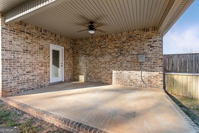 view of patio featuring ceiling fan