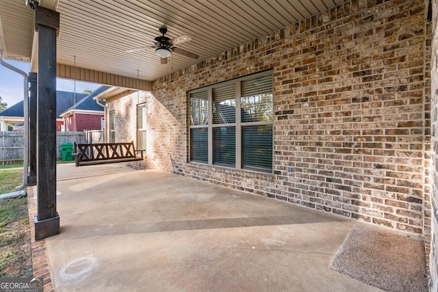 view of patio / terrace featuring ceiling fan