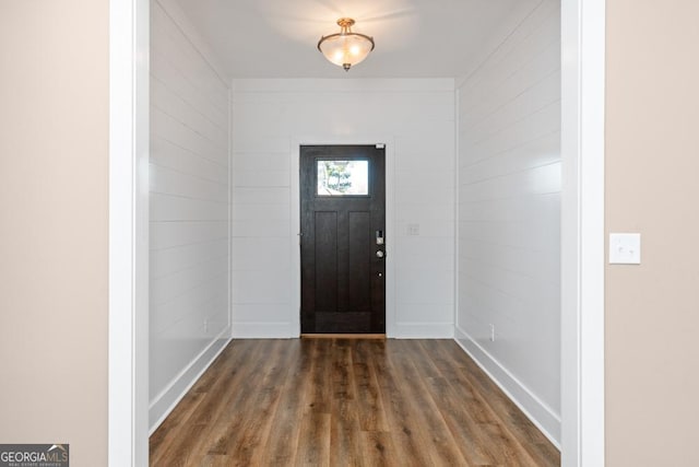 entrance foyer featuring dark hardwood / wood-style floors