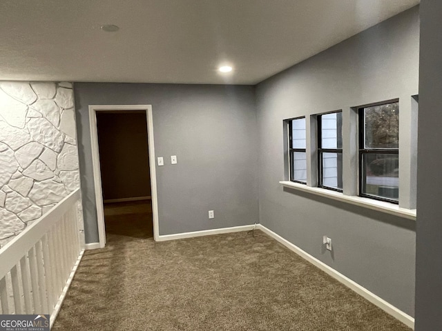 spare room featuring carpet flooring