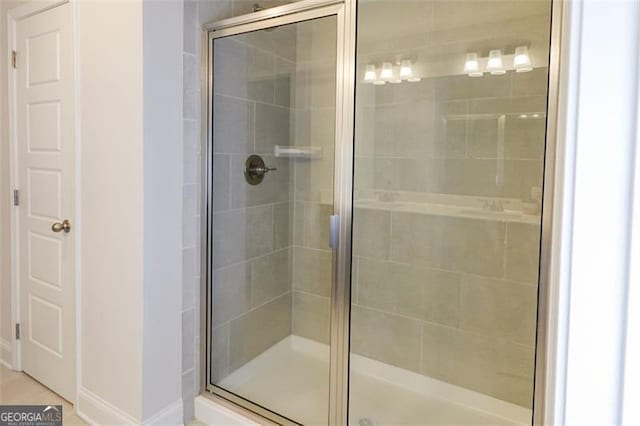 bathroom featuring walk in shower