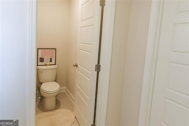 bathroom featuring toilet