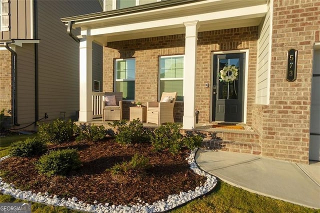 property entrance with covered porch