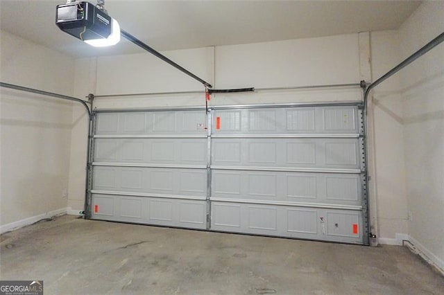 garage featuring a garage door opener