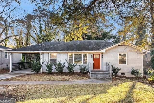 single story home with a carport and a front lawn